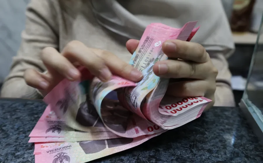 Pelemahan Rupiah Terpengaruh Sentimen Global dan Domestik
